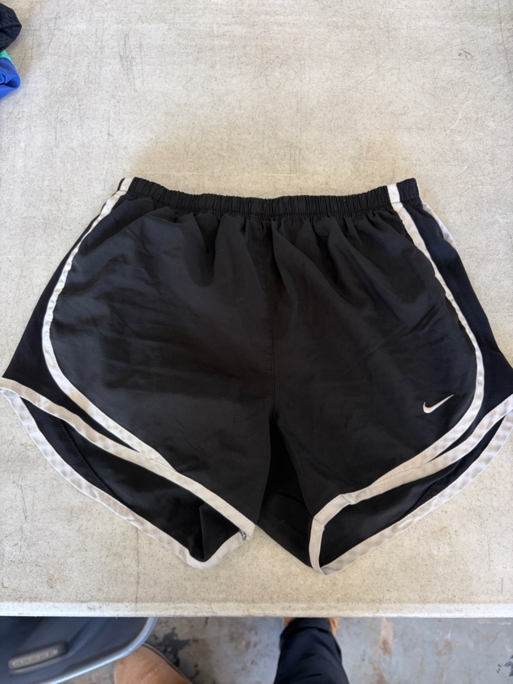 Nike Women’s Black Athletic Shorts with White Piping